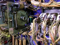 Image # 53455: The Wiggler Backbox Add-A-Ball Unit 
(This is a factory-installed unit. Its two coils allow it to step both up and down. Serial number 3022.)