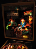 Image # 54323: Wild Card Illuminated Backglass 
(Serial number 314716.)