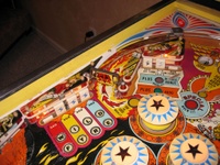 Image # 26859: Wild Fyre Upper Left Playfield 
(The spinning target shown in this image is not original to this game.)