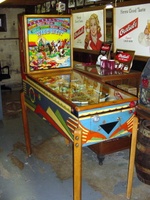 Image # 37534: Wild West Cabinet - Left 
(The right side of the lower cabinet shows a shift of color from dark blue to light blue. This light blue extends to the cabinet front. The remainder of the cabinet shows dark blue. The owner did not explain the reason for the lighter blue color.)