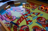 Image # 25742: Wizard! Lower Playfield - Downfield View 
(Playfield was mylared when new. Double Bonus insert is blue. Serial number 5702.)
