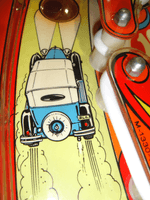 Image # 78798: Wizard! Playfield - Artist Initials 
(The license plate shows the initials for artist Dave G. Christensen.)