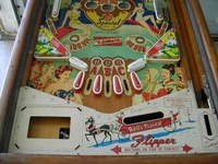Image # 16022: World Beauties Lower Playfield 
(The four red ball guides and the four yellow ball guides have switched positions on this game.)