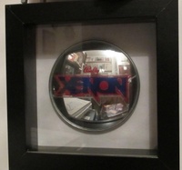 Image # 53634: Xenon Promotional Item 
(Given away at trade shows. The mirrors on production games are not labeled.)
