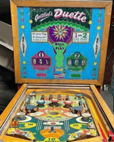 Image # 83385: Duette Deluxe Cabinet - Front View 
(This playfield is missing its rubber rings and both flippers.)