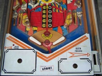 Image # 37385: Gun Men Lower Playfield 
(The outlane mini-posts are not shown in the manufacturer's flyer. )