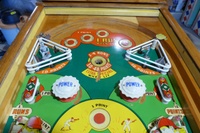 Image # 63511: Hits and Runs Upper Playfield 
(The left-side ballplayer figurine is not original to this game and has been repainted as well. The pop bumper caps have been touched up with blue ink. Serial number A1283.)