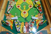 Image # 63512: Hits and Runs Lower Playfield 
(The flippers have been touched up with blue ink. The elevated screws below the flippers and at the right drop lane 10-point rebound rubber are not original to this game. Serial number A1283.)