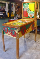 Image # 63526: Hits and Runs Cabinet - Full View 
(The left-side ballplayer figurine is not original to this game and has been repainted as well. The elevated screws below the flippers are not original to this game. Serial number A1283.)