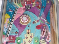 Image # 60072: Last Lap Middle Playfield 
(The pop bumper cap is not original to this game.)