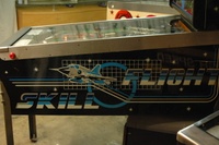 Image # 52189: Skill Flight Cabinet - Right 
(This cabinet art is on the wood, not a metal veneer from a kit.)