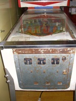 Image # 20826: Blue Ribbon German Front (with larger cabinet) 
(Here, the coin slots are part of the coin door and not in the lockdown bar. A cabinet having more depth was needed to accommodate the larger coin door. This game is serial number 'BN 1255'.)