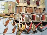 Image # 64264: Miss Universo (3 Ladies) Inside Backbox - Detail 
(A braided string has been tied to this relay, likely as a temporary solution to a repair issue.)