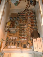 Image # 55875: Supersonic Early Production - Inside Cabinet 
(The chime unit on the lower right is not original to this game. The white cable and wire for this chime unit can be seen stapled to the cabinet wall and going to the backbox where the manufacturer's sound card and speaker used to be. Serial number 0003.)