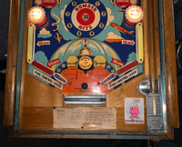 Image # 74485: Bomber Illuminated Lower Playfield 
(The manufacturer did not use black rubber rings on this game. The blocking gate crosspiece is missing.)