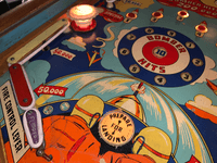 Image # 74475: Bomber Illuminated Lower Playfield - Left 
(The blocking gate crosspiece is missing.)