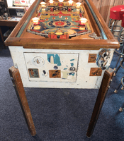 Image # 74476: Bomber Cabinet - Front 
(The cabinet has been repainted but is included to show its other features. The manufacturer did not use black rubber rings on this game. The blocking gate crosspiece is missing.)