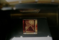 Image # 56121: Magic Picture Pin Film Strip - Detail 
(The film image is seen reflected in a mirror.)