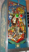 Image # 39676: The Raid Playfield 
(On this playfield, a red rubber ring has been used to block entry to the right outlane.)