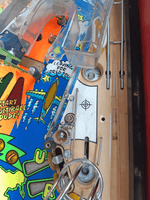 Image # 77588: Al's Garage Band Goes On a World Tour Early Production Playfield - Top Ball Lock VUK - Plastic Removed 
(The plastic light shield has been removed to show this area.)