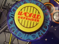 Image # 65542: World Defender Pop Bumper Cap 
(Serial number 6521.)