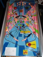 Image # 54288: West Club Playfield 
(The top left round yellow rebound rubber is from Bally. The round yellow rebound rubbers at each outlane are from Williams. These parts are not original to this game.)