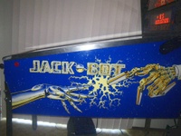 Image # 64126: Jack�Bot Gold and Yellow Cabinet - Right 
(Serial number 53351102134.)