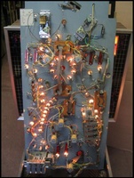 Image # 17245: Cosmic Flash Under Playfield 
(Missing right flipper coil.)