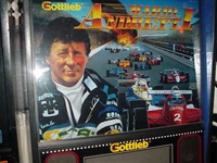 Image # 27046: Mario Andretti Autographed Backglass 
(Autograph located on left lapel.)