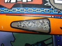 Image # 29715: Junk Yard Prototype Playfield Insert Detail 
(Unprotected, modified Insert Labeling)