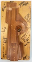 Image # 70322: Medieval Madness Right Ramp Prototype Mold 
(This solid wood tool was used to prototype thermoform the right plastic ramp (part number 03-9680.8). It measures approximately 24 x12 x 9 inches including the wood base.)