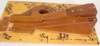 Image # 70323: Medieval Madness Right Ramp Prototype Mold 
(This solid wood tool was used to prototype thermoform the right plastic ramp (part number 03-9680.8). It measures approximately 24 x12 x 9 inches including the wood base.)