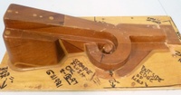 Image # 70325: Medieval Madness Right Ramp Prototype Mold 
(This solid wood tool was used to prototype thermoform the right plastic ramp (part number 03-9680.8). It measures approximately 24 x12 x 9 inches including the wood base.)