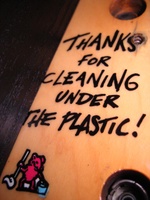 Image # 43638: Cirqus Voltaire Playfield - Detail 
(The imaged text can be found under the plastic located above the menagerie. It is not visible when the plastic is in place.)