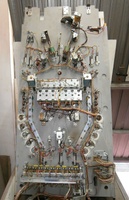 Image # 58045: Tic & Toc Under Playfield 
(Two large coils reset all seven drop targets simultaneously.)