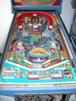 Image # 32952: Lap By Lap Playfield 
(Two of the three pop bumpers have no caps in this image.)