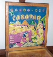 Image # 8404: Camel Caravan Repainted Backglass - Partial Name 
(The words 'Genco's CAMEL-' have been painted over on this glass.)