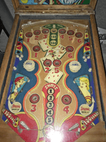 Image # 75419: Canasta Playfield 
(This playfield is missing the two flipper-shaped posts at the very top center of the playfield, above the white post, and where a rubber ring fits around all three of them.)