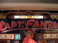 Image # 44264: Capt. Fantastic and The Brown Dirt Cowboy Early Production Backglass (Over The Top, no stars) 
(This is the Over The Top version of the backglass from game serial number 1088, the 88th game produced.)