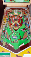 Image # 74344: Running Horse Playfield 
(The slingshot plastics and the center plastic are reproduction. The cabinet and the apron have both been repainted.  The game in the flyer used white rubber rings.)