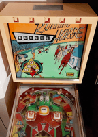 Image # 74351: Running Horse Backbox - Top 
(The cabinet has been repainted. The center playfield plastic is reproduction. The game in the flyer used white rubber rings.)