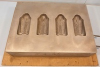 Image # 70318: Monster Bash Coffin Cover Mold 
(This tool was used to thermoform the Monster Bash Mummy Coffin cover (part number 03-9865.2). It is the original production aluminum tooling.)