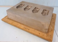 Image # 70319: Monster Bash Coffin Cover Mold 
(This tool was used to thermoform the Monster Bash Mummy Coffin cover (part number 03-9865.2). It is the original production aluminum tooling.)