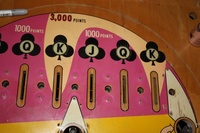 Image # 49339: Card Trix Playfield - Detail 
(Note the 'K lanes use a light beige color as compared to the white colors nearby.)
