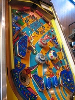 Image # 59677: Carnival Playfield - Downfield View 
(Two of the pop bumper caps do not match the ones shown in the manufacturer's flyer. Serial number 0400.)