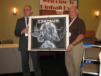 Image # 70443: Centaur Original Backglass Artwork 
(Designer Jim Patla is on the left. Artist Paul Faris is on the right.)