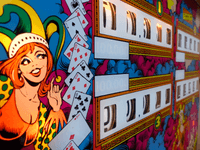 Image # 79700: Joker Poker Sample Game - Illuminated Backglass - Detail 
(Serial number 01044 S.)