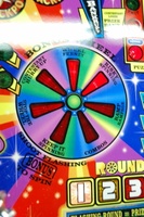 Image # 36246: Wheel Of Fortune Early Production on Assembly Line 
(Images 36235 through 36269 show one of the first ten or so games being assembled at the factory. Some playfield parts may have not yet been installed on this playfield.)