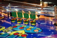 Image # 36249: Wheel Of Fortune Early Production on Assembly Line 
(Images 36235 through 36269 show one of the first ten or so games being assembled at the factory. Some playfield parts may have not yet been installed on this playfield.)
