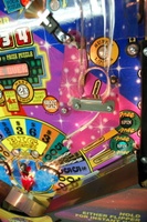 Image # 36251: Wheel Of Fortune Early Production on Assembly Line 
(Images 36235 through 36269 show one of the first ten or so games being assembled at the factory. Some playfield parts may have not yet been installed on this playfield.)